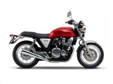 New 2017 HONDA CB1100 EX CANDY RED You want proof that a great idea never goes out of style? Then just check out the new 2017 Honda CB1100 EX. Externally, it’s pure Honda classic: that red steel tank, the air-cooled transverse-four engine, the brushed aluminum sidecovers, the round headlight, the chromed fenders, the comfortable, upright seating and tubular-steel handlebar. But twist the throttle, and you’ll see there’s nothing retro about the CB1100 EX’s performance. Displacing a full 1140cc, the six-speed overdrive gearbox and electronic fuel injection deliver performance no 1970’s classic ever could.