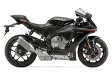 New 2015 YAMAHA YZF-R1 RAVEN The 2015 YZF-R1 features a completely new, lightweight and compact, crossplane-concept, inline-four-cylinder, 998cc high-output engine. Featuring a first ever for a production motorcycle, titanium fracture split connecting rods delivering extremely high horsepower and a strong pulse of linear torque for outstanding performance.
The YZF-R1 features the most advanced MotoGP®-inspired electronics package ever offered on a supersport machine: a full suite of inter-related technologies, enabling the rider to enjoy the fullest range of performance with great comfort, control, and ease of operation. Featuring the first six-axis Inertial Measurement Unit (IMU) ever offered on a street-going motorcycle, the 2015 R1 represents the dawn of a new digital era where all riders can experience total 3D controllability. IMU consists of a gyro sensor that measures pitch, roll, and yaw, as well as an accelerometer, or G-sensor, that measures acceleration in the fore-aft, up-down, and right-left directions…all at a rate of 125 calculations per second. By calculating each signal, the IMU finds the precise vehicle position and movement, and communicates it to the ECU, enabling it to control the bike’s systems. The 2015 R1 is fully equipped with banking-sensitive Traction Control, as well as Slide Control, Anti-Wheelie Control, Quickshifter, Launch Control, ABS, a Unified Braking System, and much more. The all-new R1 gives street riders, track day participants, and full-on racers an unmatched and unprecedented level of rider-adaptive performance. All-new aluminum Deltabox® frame is designed to provide optimum longitudinal, lateral and torsional rigidity balance. The engine is a stressed member of the chassis. An all-new titanium exhaust system with titanium headers and muffler canister with mid-ship layout is positioned low and in the middle of the chassis for centralized mass. The styling on the new R1 is inspired by the YZR-M1, purposely sculpted for maximum aerodynamic efficiency.
TAKING DEPOSITS NOW