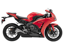 New 2015 HONDA CBR1000RR RED Honda’s CBR1000RR is a legend among Superbike riders and the 2015 model is clearly the best CBR1000RR we’ve ever offered, especially since you can get one with our revolutionary C-ABS. There’s no room for second best in this class, and the CBR1000RR is a standout performer both on and off the track. No motorcycle connects rider, machine and road like a sportbike. The immediate acceleration, the chassis that feels like an extension of your own skeleton, the power, the handling—and the bigger the sportbike, the more intense the experience.
Honda’s CBR1000RR has long been the ultimate Superbike for experienced aficionados, and the 2015 CBR1000RR is really something special. First off, we’re celebrating Honda MotoGP rider Marc Marquez’s back-to-back World Championships with some special graphics packages on the standard and SP models. Then there’s the CBR1000RR ABS version, with the most sophisticated brake package in the class. But here’s the biggest news: Track-day enthusiasts need to check out the CBR1000RR SP Repsol Edition version. With fully adjustable Öhlins front and rear suspension, Brembo front brakes and Pirelli Diablo Supercorsa SC premium tires. The SP also includes a special lightweight subframe with solo seat cowl. The SP doesn’t stop there, with hand-selected engine parts for weight and balance, including pistons and connecting rods