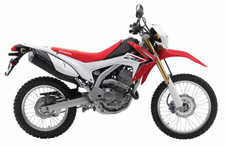 New 2016 HONDA CRF250L RED If motorcycling is all about freedom, then the CRF250L is one of the best bikes on the planet. Dirt trails, gravel roads, city streets, open highways—the CRF250L is your loyal travelling company for all of them.
If motorcycling is all about practicality, the CRF250L is still one of the best choices you can make. Awesome fuel economy. Tough, go-anywhere construction. A simple, reliable single-cylinder Honda engine with a wide powerband. An upright seating position that’s comfortable for a wide range of riders, from short to tall, beginner to expert.
And if motorcycling is all about fun, well the CRF250L is a knockout. Light, narrow, and able to take you just about anywhere a motorcycle can, we dare you to ride one and not come back with a huge smile in your helmet.
Look, no matter what you think a motorcycle should be, the CRF250L is a bike we’re sure you’ll enjoy. And the more you ride one, the more you’ll agree.