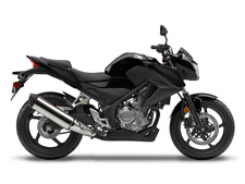 New 2016 HONDA CB300F BLACK The best part of any motorcycle has never been the bells and whistles. It’s been the freedom and the exhilaration that comes with riding. And in fact, plenty of riders feel that less is more, that a simple bike done right gives you the purest riding experience of all.
That’s one of the reasons we built the CB300F. It’s a great machine, loaded with features, but in a lighter, smaller, simpler package. It’s a great choice for the urban rider, as a first bike, or really for anyone who wants a great motorcycle.
Like our CBR300R, the CB300F uses a totally up-to-date single-cylinder engine. The fuel injection system and electric start make it convenient, but the best feature of all may be its combination of enthusiastic power delivery along with awesome fuel efficiency. Practical meets performance—it’s not an either/or proposition with the CB300F—you get to have your cake and eat it too. And with its low price, you’ll be able to afford lots of cake.