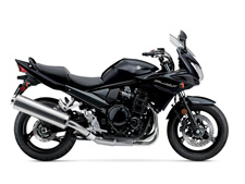 New 2016 SUZUKI BANDIT 1250S ABS BLACK You can’t break the laws of physics, but the 2016 Suzuki Bandit 1250S ABS shows that you sure can bend them. Its Suzuki fuel-injected four-cylinder engine offers thrilling acceleration in every gear, with a rush of high-rpm performance. For crisp, precise handling on twisty roads, it has balanced suspension systems front and rear. It also features a technically advanced Antilock Braking System (ABS)* that monitors wheel speed, and matches stopping power to available traction.
*Depending on road surface conditions, such as wet, loose, or uneven roads, braking distance for an ABS-equipped vehicle may be longer than for a vehicle not equipped with ABS. ABS cannot prevent wheel skidding caused by braking while cornering. Please ride carefully and do not overly rely on ABS.