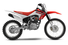 New 2017 HONDA CRF230F RED Remember back in the good old days, when bikes were light, simple, affordable, and most of all fun? Honda made some of the best bikes ever, machines that put a whole generation of riders on two wheels, and kept them there their whole lives. Well, guess what? Honda still makes bikes like that, and our CRF230F is a perfect example. Just hop on, push the electric starter, and have a blast. Because it’s a Honda four-stroke, you don’t have to worry about excessive maintenance. With its overall size, sturdy frame and lightweight components, the CRF230F is just the right size for adults or larger teens who can’t wait to take on the twists and turns of the trail.