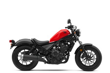 New 2017 HONDA REBEL 500 RED The Rebel 500 is a true triple threat: part impressive performance, part minimalist good looks and completely fun to ride. The first thing you’ll notice is its subtle, blacked-out looks. From the compact frame to its low-slung seat, it’s just cool. Once you get on, you’ll know immediately that this bike was meant to be ridden, thanks to an impressive lean angle, and a 471cc parallel-twin engine tuned for middle and upper-rpms. Ride it stock. Trick it out. Either way, this bike just feels right.