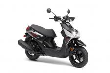 New 2018 YAMAHA ZUMA 125 LIQUID SILVER Rugged, Modern Design
Beneath the sleek styling, the Zuma 125 is built around a strong steel frame with fat, aggressive tires on cast aluminum wheels, tough suspension, and protective off-road-style brush deflectors and fork tube boots. This scooter boasts capability on roads of all sorts, with plenty of attitude for your daily commute.
Potent Fuel Injected Engine
Powering the Zuma 125 is a compact 125cc 4-stroke engine with 4 valves, a 10:1 compression ratio, ceramic-composite cylinder liner, and electronic fuel injection—giving this scooter modern reliability and economical performance. With an amazing 103 mpg* and a 1.7- gallon fuel tank, you get plenty of range, too.
Automatic Convenience
A fully-automatic V-belt transmission and push-button electric starting make the Zuma 125 super-convenient transportation. Standard center and side stands, along with a locking cover on the ignition switch, make it easy and secure to park, too.
Roomy, Step-Through Ergonomics
There’s room for two atop the Zuma 125′s seat, and lots of locking storage beneath it. The step-through floorboards making getting on and off a breeze, too.