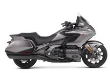 New 2018 HONDA GOLDWING DCT MATTE MAJESTIC SILVER THE ULTIMATE PERFORMANCE TOURING MACHINE
This is a bike 43 years in the making. Rebuilt from the road up. Refined inside and out. Ready for anything. There’s a new engine. New front suspension. Available 7-speed DCT. All in a more agile body that’s over 85 pounds lighter. You’ll also find the latest in technology, including Apple CarPlayTM integration, and five distinct trim levels to suit your style. The 2018 Gold Wing is designed to push the limits of what a touring bike can be. And expand the adventure beyond anything imagined.
247894