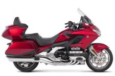 New 2018 HONDA GOLDWING TOUR DCT CANDY ARDENT RED THE ULTIMATE PERFORMANCE TOURING MACHINE
This is a bike 43 years in the making. Rebuilt from the road up. Refined inside and out. Ready for anything. There’s a new engine. New front suspension. Available 7-speed DCT. All in a more agile body that’s over 85 pounds lighter. You’ll also find the latest in technology, including Apple CarPlayTM integration, and five distinct trim levels to suit your style. The 2018 Gold Wing is designed to push the limits of what a touring bike can be. And expand the adventure beyond anything imagined.
247858