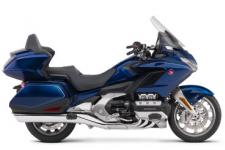 New 2018 HONDA GOLDWING TOUR DCT PEARL HAWKSEYE BLUE THE ULTIMATE PERFORMANCE TOURING MACHINE
This is a bike 43 years in the making. Rebuilt from the road up. Refined inside and out. Ready for anything. There’s a new engine. New front suspension. Available 7-speed DCT. All in a more agile body that’s over 85 pounds lighter. You’ll also find the latest in technology, including Apple CarPlayTM integration, and five distinct trim levels to suit your style. The 2018 Gold Wing is designed to push the limits of what a touring bike can be. And expand the adventure beyond anything imagined.
247867