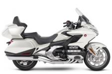 New 2018 HONDA GOLDWING TOUR DCT PEARL WHITE THE ULTIMATE PERFORMANCE TOURING MACHINE
This is a bike 43 years in the making. Rebuilt from the road up. Refined inside and out. Ready for anything. There’s a new engine. New front suspension. Available 7-speed DCT. All in a more agile body that’s over 85 pounds lighter. You’ll also find the latest in technology, including Apple CarPlayTM integration, and five distinct trim levels to suit your style. The 2018 Gold Wing is designed to push the limits of what a touring bike can be. And expand the adventure beyond anything imagined.
247853