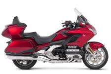 New 2018 HONDA GOLDWING TOUR CANDY ARDENT RED THE ULTIMATE PERFORMANCE TOURING MACHINE
This is a bike 43 years in the making. Rebuilt from the road up. Refined inside and out. Ready for anything. There’s a new engine. New front suspension. Available 7-speed DCT. All in a more agile body that’s over 85 pounds lighter. You’ll also find the latest in technology, including Apple CarPlayTM integration, and five distinct trim levels to suit your style. The 2018 Gold Wing is designed to push the limits of what a touring bike can be. And expand the adventure beyond anything imagined.
247838