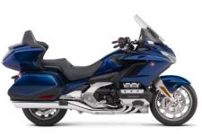 New 2018 HONDA GOLDWING TOUR PEARL HAWKSEYE BLUE THE ULTIMATE PERFORMANCE TOURING MACHINE
This is a bike 43 years in the making. Rebuilt from the road up. Refined inside and out. Ready for anything. There’s a new engine. New front suspension. Available 7-speed DCT. All in a more agile body that’s over 85 pounds lighter. You’ll also find the latest in technology, including Apple CarPlayTM integration, and five distinct trim levels to suit your style. The 2018 Gold Wing is designed to push the limits of what a touring bike can be. And expand the adventure beyond anything imagined.
247847