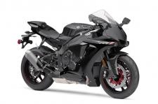 New 2018 YAMAHA YZF-R1 RAVEN
MotoGP®-Derived Crossplane Crankshaft Superbike
The YZF-R1® features a lightweight and compact crossplane crankshaft, inline-four-cylinder, 998cc high output engine. Featuring titanium fracture-split connecting rods, an offset cylinder block and magnesium covers, the motor delivers extremely high horsepower and a strong pulse of linear torque for outstanding performance, all wrapped in aerodynamic MotoGP®-style bodywork.
Class-Leading Electronics Package
The YZF-R1 features the most advanced electronics package ever offered on a supersport machine, with a full suite of interrelated technologies that enable the rider to enjoy the fullest range of performance with greater comfort, control, and ease of operation than ever before.
MotoGP®-Level Controllability
The YZF-R1 pioneered the use of the first six-axis Inertial Measurement Unit (IMU) ever offered on a street-going motorcycle. The IMU consists of a gyro sensor that measures pitch, roll, and yaw, as well as an accelerometer that measures acceleration in the fore-aft, up-down, and right-left directions… all at a rate of 125 calculations per second. By calculating each signal, the IMU finds the precise vehicle position and movement, and communicates it to the ECU, enabling it to control the bike’s systems.
Digital Rider Aids
The YZF-R1 is fully equipped with banking-sensitive Traction Control and unified ABS, as well as Slide Control, Launch Control, and more. For 2018, the Quick Shift System is updated to give both up and downshifting ability, automatically matching engine speed on downshifts for rapid clutchless shifts in either direction. The Wheel Lift Control system is also refined for smoother intervention and improved forward drive.
Deltabox® Chassis
Advanced aluminum Deltabox® frame uses the engine as a stressed member of the chassis and is designed to provide optimum longitudinal, lateral and torsional rigidity balance. Fully adjustable suspension front and rear provides exceptional road-holding and tuneability.