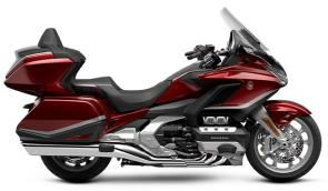 The Honda Gold Wing has always been a spectacular touring bike, ever since the first GL1000 back in 1975. And over the years, our engineers have always stayed true to that vision, but theyve strived to make the bike better and better. Our 2021 model is a perfect example of that. Refinements abound, but the best parts remain the same. Youll still have your choice of both manual-transmission models and Gold Wings featuring our exclusive automatic DCT transmission, but this year the trunk is bigger for more road-trip storage, the speakers have a higher 55-watt rating, and the passenger seat on our Tour models is improved. We also freshened up some styling touches, like solid red tail lights and paint choices; check out the grey with orange accent stripe on our no-trunk models! Plus, all Gold Wings are now Android Auto compatible, as well as offering Apple CarPlay. All in all, a truly great motorcycle gets even better; so your dream ride has everything youll need to make memories that last a lifetime.
