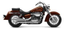 New 2018 HONDA SHADOW AERO 750 ABS STALLION BROWN LOOKS RIGHT. RIDES EVEN BETTER.
There are lots of imaginative, high-tech ways to cook. But sometimes you want to go traditional—like a big, thick steak grilled over some hardwood coals. Same with your motorcycle. The latest and greatest is right for some, but there are plenty of riders who enjoy a traditional, relaxed experience when it comes to their bike. And that’s precisely why we build the Honda Shadow Aero.
Our Shadow cruisers are some of the most popular bikes on the road, and one look at the Shadow Aero will tell you why. Features like its spoked wheels, full fenders and long, chromed mufflers are all about taking it easy and looking good while you’re doing it. But the Aero rider also gets some thoroughly modern performance courtesy of this bike’s 745 cc V-twin engine, specially tuned for low-revving torque. Maintenance-reducing features like shaft final drive make this motorcycle truly easy to own. Plus, the Aero is a huge bargain, giving you a big-bike ride without the big-bike price. 247799