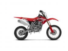 New 2018 HONDA CRF150R RED What parent doesn’t want the best for his or her kids? You try to give them every advantage you can—a safe place to live, a good education. You try to be a good role model. You teach them that if they’re going to try, they should try their hardest. And nothing delivers that lesson like competition.
Honda’s CRF150R is designed to give your young Red Rider the biggest advantage ever on the motocross track. It’s not just an off-road bike with a low seat height; it’s a serious competition machine tailor-maid for young racers. Designed around a single-cylinder Honda Unicam engine, it offers all the performance your riders need to keep them at the front of the pack and get them on top of the podium. For 2018 we’ve updated the CRF150R’s look with new graphics right in line with our open-class CRF450R’s.
Plus, since the right-sized bike is critical, to fit a wider variety of riders, we also make the CRF150R available in a second version: the CRF150R Expert, featuring bigger wheels, a higher seat and longer swingarm.