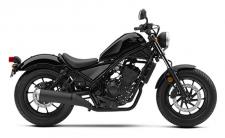 New 2018 HONDA REBEL 300 BLACK TAKE THIS BIKE TO NEW PLACES.
You might say this bike is the ultimate balance of performance and style. Designed for riders of all skill levels, it’s equipped with a sporty engine and has an optimal lean angle so it rides great. It also looks terrific with its blacked-out touches, compact frame and low-slung seat. And this year, it’s available in a stunning Candy Lightning Blue. As perfect as the Rebel 300 seems stock, it’s going to be hard to resist making a few tweaks. We say go for it. 246691