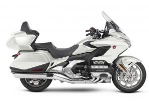 New 2018 HONDA GOLDWING TOUR PEARL WHITE THE ULTIMATE PERFORMANCE TOURING MACHINE
This is a bike 43 years in the making. Rebuilt from the road up. Refined inside and out. Ready for anything. There’s a new engine. New front suspension. Available 7-speed DCT. All in a more agile body that’s over 85 pounds lighter. You’ll also find the latest in technology, including Apple CarPlayTM integration, and five distinct trim levels to suit your style. The 2018 Gold Wing is designed to push the limits of what a touring bike can be. And expand the adventure beyond anything imagined.
247833