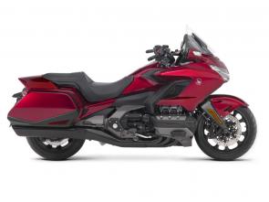 New 2018 HONDA GOLDWING DCT CANDY ARDENT RED THE ULTIMATE PERFORMANCE TOURING MACHINE
This is a bike 43 years in the making. Rebuilt from the road up. Refined inside and out. Ready for anything. There’s a new engine. New front suspension. Available 7-speed DCT. All in a more agile body that’s over 85 pounds lighter. You’ll also find the latest in technology, including Apple CarPlayTM integration, and five distinct trim levels to suit your style. The 2018 Gold Wing is designed to push the limits of what a touring bike can be. And expand the adventure beyond anything imagined.
247898
