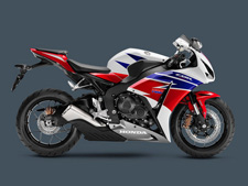 New 2015 HONDA CBR1000RR TRI-COLOR Honda’s CBR1000RR is a legend among Superbike riders and the 2015 model is clearly the best CBR1000RR we’ve ever offered, especially since you can get one with our revolutionary C-ABS. There’s no room for second best in this class, and the CBR1000RR is a standout performer both on and off the track. No motorcycle connects rider, machine and road like a sportbike. The immediate acceleration, the chassis that feels like an extension of your own skeleton, the power, the handling—and the bigger the sportbike, the more intense the experience.
Honda’s CBR1000RR has long been the ultimate Superbike for experienced aficionados, and the 2015 CBR1000RR is really something special. First off, we’re celebrating Honda MotoGP rider Marc Marquez’s back-to-back World Championships with some special graphics packages on the standard and SP models. Then there’s the CBR1000RR ABS version, with the most sophisticated brake package in the class. But here’s the biggest news: Track-day enthusiasts need to check out the CBR1000RR SP Repsol Edition version. With fully adjustable Öhlins front and rear suspension, Brembo front brakes and Pirelli Diablo Supercorsa SC premium tires. The SP also includes a special lightweight subframe with solo seat cowl. The SP doesn’t stop there, with hand-selected engine parts for weight and balance, including pistons and connecting rods.