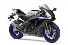 New 2018 YAMAHA YZF-R1M
Crossplane Crankshaft Superbike
The YZF-R1M® features a lightweight and compact crossplane crankshaft, inline-four-cylinder, 998cc high output engine. Featuring titanium fracture-split connecting rods, an offset cylinder block and magnesium covers, the motor delivers extremely high horsepower and a strong pulse of linear torque for outstanding performance, all wrapped in aerodynamic MotoGP®-style bodywork.
Class-Leading Electronics Package
The YZF-R1M features the most advanced electronics package ever offered on a supersport machine, with a full suite of interrelated technologies that enable the rider to enjoy the fullest range of performance with greater comfort, control, and ease of operation than ever before.
The Ultimate MotoGP®-Derived Supersport
The YZF-R1M features an Öhlins® Electronic Racing Suspension (ERS), carbon fiber bodywork, and a Communication Control Unit (CCU) with GPS that enables the rider to capture ride data and then download it via WiFi to the Yamaha Y-TRAC smartphone and tablet app. Once the data is downloaded, the rider can analyze directly over the GPS track map. Setting changes can then be made via the YRC Setting app and uploaded back to the R1M.
MotoGP®-Level Controllability
The YZF-R1M pioneered the use of the first six-axis Inertial Measurement Unit (IMU) ever offered on a street-going motorcycle. The IMU consists of a gyro sensor that measures pitch, roll, and yaw, as well as an accelerometer that measures acceleration in the fore-aft, up-down, and right-left directions… all at a rate of 125 calculations per second. By calculating each signal, the IMU finds the precise vehicle position and movement, and communicates it to the ECU, enabling it to control the bike’s systems.
Digital Rider Aids
The YZF-R1M is fully equipped with banking-sensitive Traction Control and unified ABS, as well as Slide Control, Launch Control, and more. For 2018, the Quick Shift System is updated to give both up and downshifting ability, automatically matching engine speed on downshifts for rapid clutchless shifts in either direction. The Wheel Lift Control system is also refined for smoother intervention and improved forward drive.
Deltabox® Chassis
Advanced aluminum Deltabox® frame uses the engine as a stressed member of the chassis and is designed to provide optimum longitudinal, lateral and torsional rigidity balance. Fully adjustable suspension front and rear provides exceptional road-holding and tuneability.
Compact Stacked Transmission
A 6-speed transmission features close-ratio gearing to best match the high-revving engine. The transmission also stacks the input/output shafts to centralize mass and to keep the overall engine size shorter front-to-back, which optimizes engine placement in the frame for outstanding weight balance.