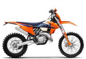 Quite literally in a class of its own, the 2022 KTM 150 XC-W TPI is an unlikely underdog in the world of enduro. Proudly featuring KTMs proven transfer port injection technology, supreme agility, and surprising 2-stroke power, it helps elevate rider and machine to incredible new levels of competence. Light enough to be hauled up the hardest of trails, yet packing enough punch to hang on to the big boys, the KTM 150 XC-W TPI commands respect.