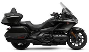 The Honda Gold Wing has always been a spectacular touring bike, ever since the first GL1000 back in 1975. And over the years, our engineers have always stayed true to that vision, but they�ve strived to make the bike better and better. Our 2021 model is a perfect example of that. Refinements abound, but the best parts remain the same. You�ll still have your choice of both manual-transmission models and Gold Wings featuring our exclusive automatic DCT transmission, but this year the trunk is bigger for more road-trip storage, the speakers have a higher 55-watt rating, and the passenger seat on our Tour models is improved. We also freshened up some styling touches, like solid red tail lights and paint choices�check out the grey with orange accent stripe on our no-trunk models! Plus, all Gold Wings are now Android Auto compatible, as well as offering Apple CarPlay�. All in all, a truly great motorcycle gets even better�so your dream ride has everything you�ll need to make memories that last a lifetime.
