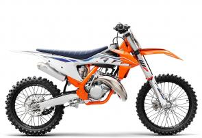 The KTM 125 SX is the most compact and lightweight of the full-sized KTM motocross arsenal, delivering championship-winning performance to up-and-coming racers. Due to its confidence-inspiring performance, lightweight chassis and overall agility, the KTM 125 SX has become the most competitive 125 cc 2-Stroke engine in its class. For 2022, This 2-Stroke screamer is the ultimate entry point into the pro ranks and a sure-fire way to add to the trophy collection. 