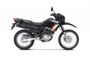 Remember how much fun you had on your first bike, whether we’re talking about a bicycle or a motorcycle? That’s what you’re going to experience again on a new Honda XR150L. This great little machine hits the motorcycling sweet spot perfectly: It’s just the right size to enjoy at a campground or exploring the countryside. It’s rugged enough to handle trail rides, but is ready for the street too for jaunts into town or on scenic back roads. Built with legendary Honda reliability like our famous XR off-roaders, you get the convenience of an electric starter, the versatility of a rear cargo rack, and some pretty spectacular fuel efficiency. In terms of price, that’s a dream come true too. And dont forget to check out our line of Honda accessories like saddlebags, hand guards, a skid plate and more that make this awesome bike even more fun and adaptable.
XR150LP