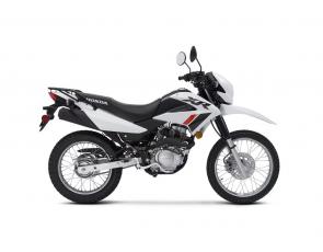 Remember how much fun you had on your first bike, whether we’re talking about a bicycle or a motorcycle? That’s what you’re going to experience again on a new Honda XR150L. This great little machine hits the motorcycling sweet spot perfectly: It’s just the right size to enjoy at a campground or exploring the countryside. It’s rugged enough to handle trail rides, but is ready for the street too for jaunts into town or on scenic back roads. Built with legendary Honda reliability like our famous XR off-roaders, you get the convenience of an electric starter, the versatility of a rear cargo rack, and some pretty spectacular fuel efficiency. In terms of price, that’s a dream come true too. And dont forget to check out our line of Honda accessories like saddlebags, hand guards, a skid plate and more that make this awesome bike even more fun and adaptable.
XR150LP