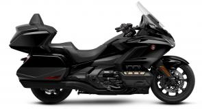 The open road is calling, and it always has been. Humans are just hard-wired to explore, to want to see what’s over the horizon. Every motorcyclist knows the feeling. And one motorcycle makes it happen better than any other: the Honda Gold Wing. All four Gold Wing trim levels this year get updated highlight stripes and colors, as well as a navigation-system map update. But the best parts remain—the famously smooth 1833cc six-cylinder engine, refined bodywork for weather protection, and ample luggage. Full of innovative engineering, all Gold Wing models are Android Auto™ compatible, as well as offering Apple CarPlay™ compatibility. You can choose between a conventional six-speed transmission and our exclusive Honda automatic seven-speed DCT transmission, depending on the model. So go ahead—isn’t it time you experience the gold standard of touring bikes?
GL1800D