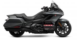 The open road is calling, and it always has been. Humans are just hard-wired to explore, to want to see what’s over the horizon. Every motorcyclist knows the feeling. And one motorcycle makes it happen better than any other: the Honda Gold Wing. All four Gold Wing trim levels this year get updated highlight stripes and colors, as well as a navigation-system map update. But the best parts remain—the famously smooth 1833cc six-cylinder engine, refined bodywork for weather protection, and ample luggage. Full of innovative engineering, all Gold Wing models are Android Auto™ compatible, as well as offering Apple CarPlay™ compatibility. You can choose between a conventional six-speed transmission and our exclusive Honda automatic seven-speed DCT transmission, depending on the model. So go ahead—isn’t it time you experience the gold standard of touring bikes?
GL1800B 