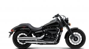 From its blacked-out V-twin engine to its subtle chrome accents, the Honda Shadow Phantom is the understated over-achiever that proves confidence can be quiet. Cruiser details like pullback handlebar, a low center of gravity and approachable seat-height offer a ride quality that backs up the bike’s stealthy swagger. It’s designed to be comfortable, with a final shaft drive that’s easy to maintain and a wide torque spread that lets you enjoy every mile. The Shadow Phantom may look elusive, but with this modern cruiser, fun is never hard to find.
VT750C2B
