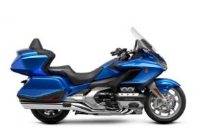 Has there ever been a time when we’ve appreciated a bike like the Honda Gold Wing as much as we do today? It’s designed to let you get out and explore—and to share that precious time with a like-minded companion. You’ll discover (or rediscover) just how much we all need to reconnect with the great outdoors. With its famously smooth 1833 six-cylinder engine, refined bodywork for weather protection, and ample luggage, where you go—and for how long—is totally up to you. Plus, this latest generation of Gold Wing is lighter and more agile, with a level of performance most touring bikes can only dream of. Full of innovative engineering, all Gold Wing models are Android Auto™ compatible, as well as offering Apple CarPlay™ integration. You can choose between a conventional six-speed transmission and Honda’s exclusive automatic seven-speed DCT transmission, depending on the model. And make sure you check out the new color options for 2022!