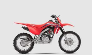 FUN COMES IN ALL SIZES
Choosing the right size of off-road bike means two things: the right level of power, and a seat height and overall package that fits. And that’s where our CRF125F and CRF125F Big Wheel really shine. The two sizes cover a wide range of enthusiasts, from younger riders and smaller adults to taller adolescents and more. With both, you get our legendary Honda reliability and user-friendly powerband. Fuel injection eliminates carburetor woes, and the four-speed transmission and conventional clutch provide the control of a full-sized bike. Long-travel suspension delivers a comfortable ride. And a graphics package right off our factory MX bikes pumps up the pride factor too. The CRF125F Big Wheel is all that with a seat height that’s about two inches taller, and the bigger wheels give it a little more ground clearance too. Either way, you can’t go wrong!

Be A Responsible Rider: All parents need to consider their youngsters age, size, ability and maturity before allowing them to ride. Obtain a copy of Off-Road Safety Tips from your local Honda Dealer.