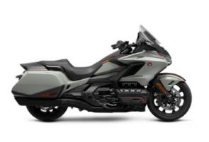 The Honda Gold Wing has always been a spectacular touring bike, ever since the first GL1000 back in 1975. And over the years, our engineers have always stayed true to that vision, but they�ve strived to make the bike better and better. Our 2021 model is a perfect example of that. Refinements abound, but the best parts remain the same. You�ll still have your choice of both manual-transmission models and Gold Wings featuring our exclusive automatic DCT transmission, but this year the trunk is bigger for more road-trip storage, the speakers have a higher 55-watt rating, and the passenger seat on our Tour models is improved. We also freshened up some styling touches, like solid red tail lights and paint choices�check out the grey with orange accent stripe on our no-trunk models! Plus, all Gold Wings are now Android Auto compatible, as well as offering Apple CarPlay�. All in all, a truly great motorcycle gets even better�so your dream ride has everything you�ll need to make memories that last a lifetime.